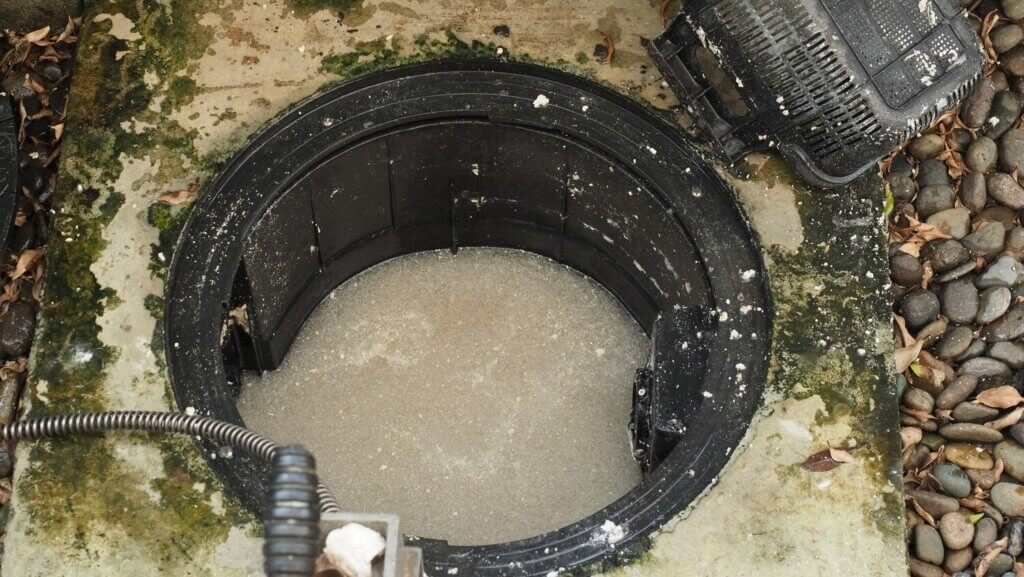 drain cleaning plumber repairing clogged grease trap with auger machine maintenance sewage system grease trap by professional plumber using auger snake fix unclog drain 258335 2393 drain cleaning plumber repairing clogged grease trap with auger machine maintenance sewage system grease trap by professional plumber using auger snake fix unclog drain 258335 2393